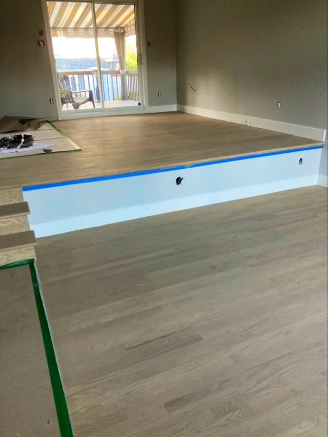 A hardwood floor prepped for repair and refinishing